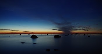 Body of Water Under Blue Skies during Golden Hour
