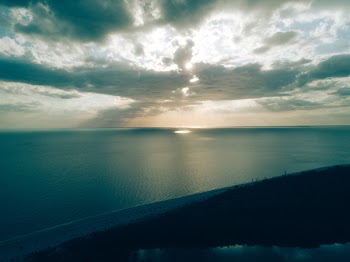Body of Water Under Sky