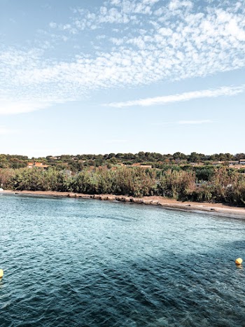 Body of Water Under White and Blue Sky