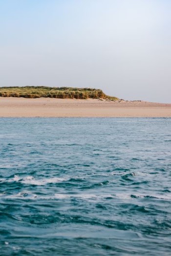 body of water with a view of island