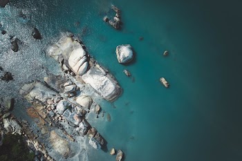 Body of Water With Rocks