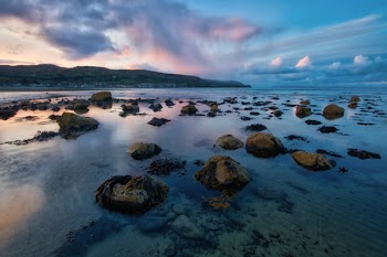 Body Of Water With Rocks 