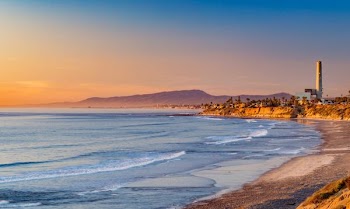 body of water with waves during daytime