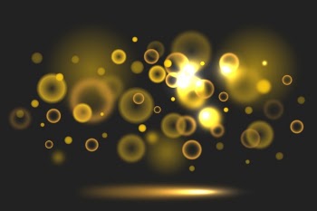 Bokeh gradient golden lights on dark background Free Vector