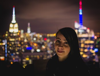 Bokeh Photograph of Woman during Nighttime