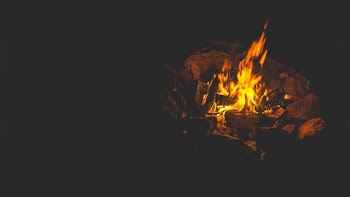bonfire surrounded by rocks