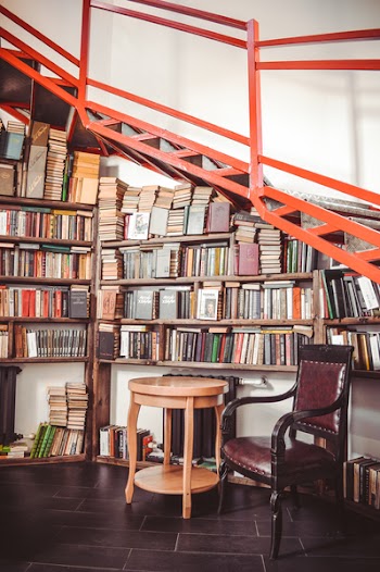 Book Lots on Wooden Shelf