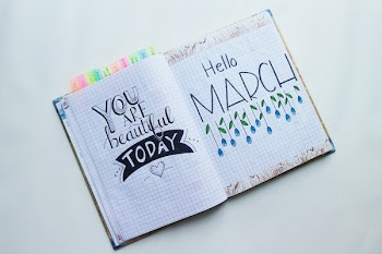 Book Page With Hello March Text