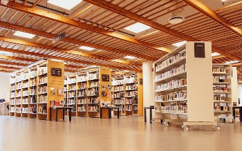 Bookshelf in library. Free public | Free Photo - rawpixel