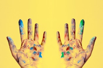 Both Hands Stained With Paints