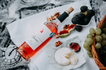 Bottle Beside Cheese