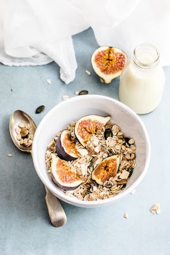 bottle of milk beside bowl