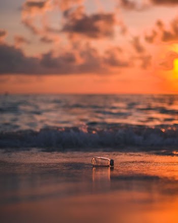 bottle on seashore