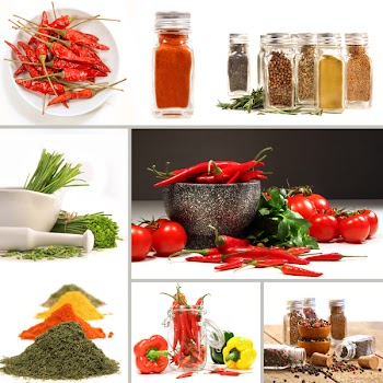 Bottles of colorful spices with grey background