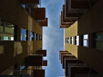 Bottom View of Beige Concrete Buildings