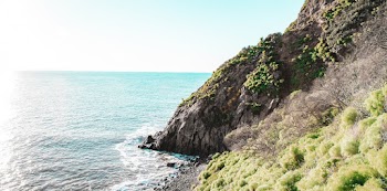 Boulder on Body of Water