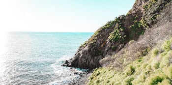 Boulder on Body of Water