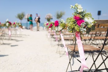 bouquet of flower attach to chair
