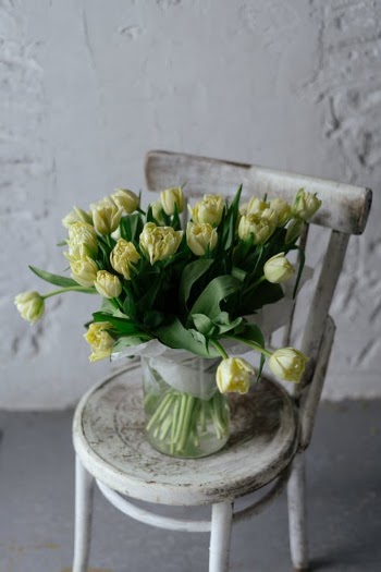 Bouquet of Flowers in Vase on Chair · Free Stock Photo