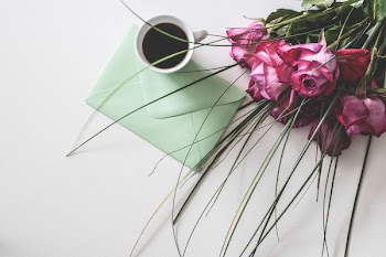 Bouquet of Pink Flowers Beside White Ceramic Mug