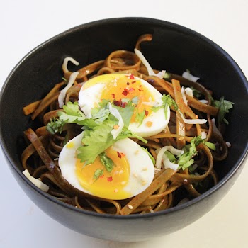 Bowl Filled With Noodles and Hard Boiled Egg
