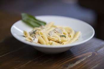 Bowl of Pasta on Wooden Surface