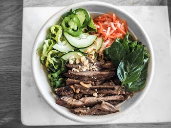 Bowl of Sliced Vegetables and Meat