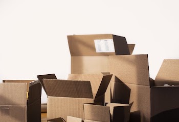 Boxes In The Process Of Being Packed