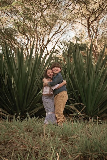 Boy and Girl Hugs Each Other Outdoor