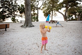 Boy Drinking With Yellow Bottle