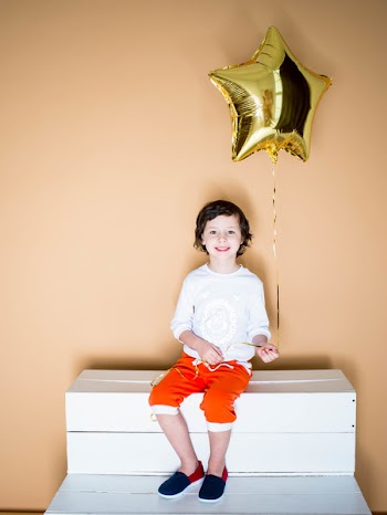 Boy Holding Balloon
