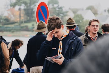 Boy Holding Brochure