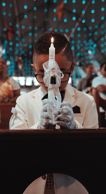 Boy Holding Candle