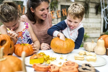 Boy Holding Pumpkin