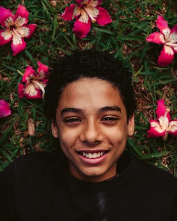 Boy In Black Jacket