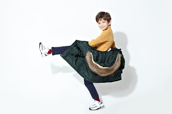 Boy in Green Parka Jacket
