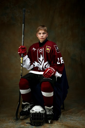 Boy in Red Ice Hockey Gear