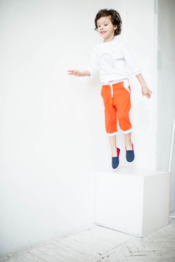 Boy Jumping Near Wall