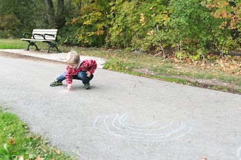 Boy Making Sidewalk Art