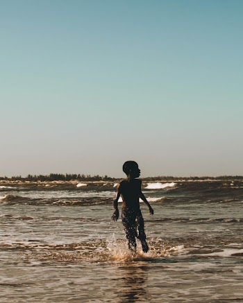 Boy on Body of Water