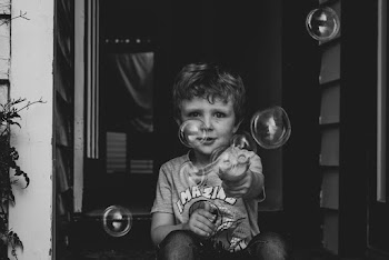 Boy Playing Bubbles