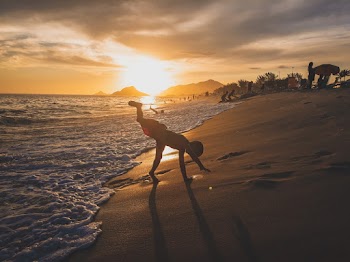 Boy Playing Near Shore
