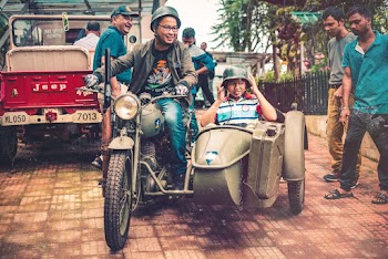 Boy Rides 3-wheeled Motorcycle