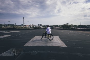 Boy Riding A Bike