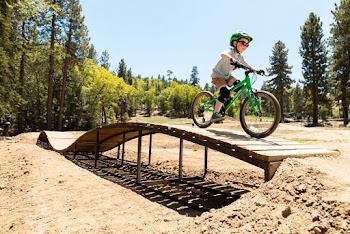 Boy Riding Bicycle