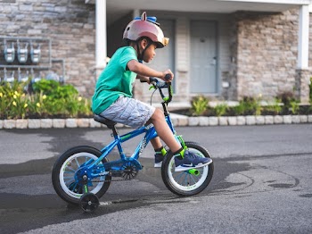 Boy Riding Bicycle