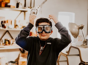 Boy Standing Inside Room