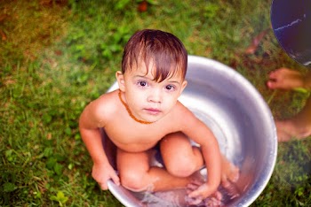 Boy Taking Bath on Basin