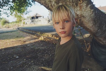Boy Under A Tree