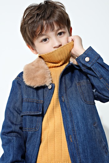 Boy Wearing Blue Denim Jacket
